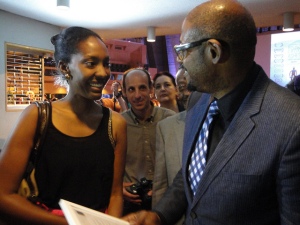 Forrest Whitaker accepts a gift from a Rwandan student at the film's screening
